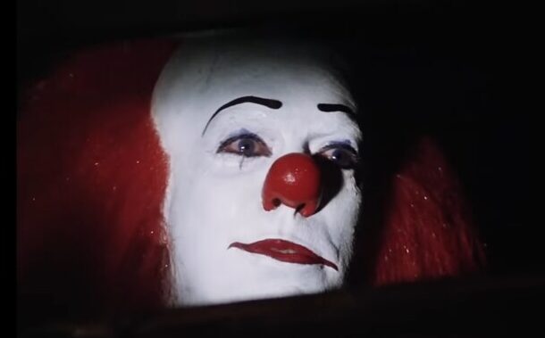 A clown with no hope, too powerless to even become the Joker, watching the world in helpless silence
